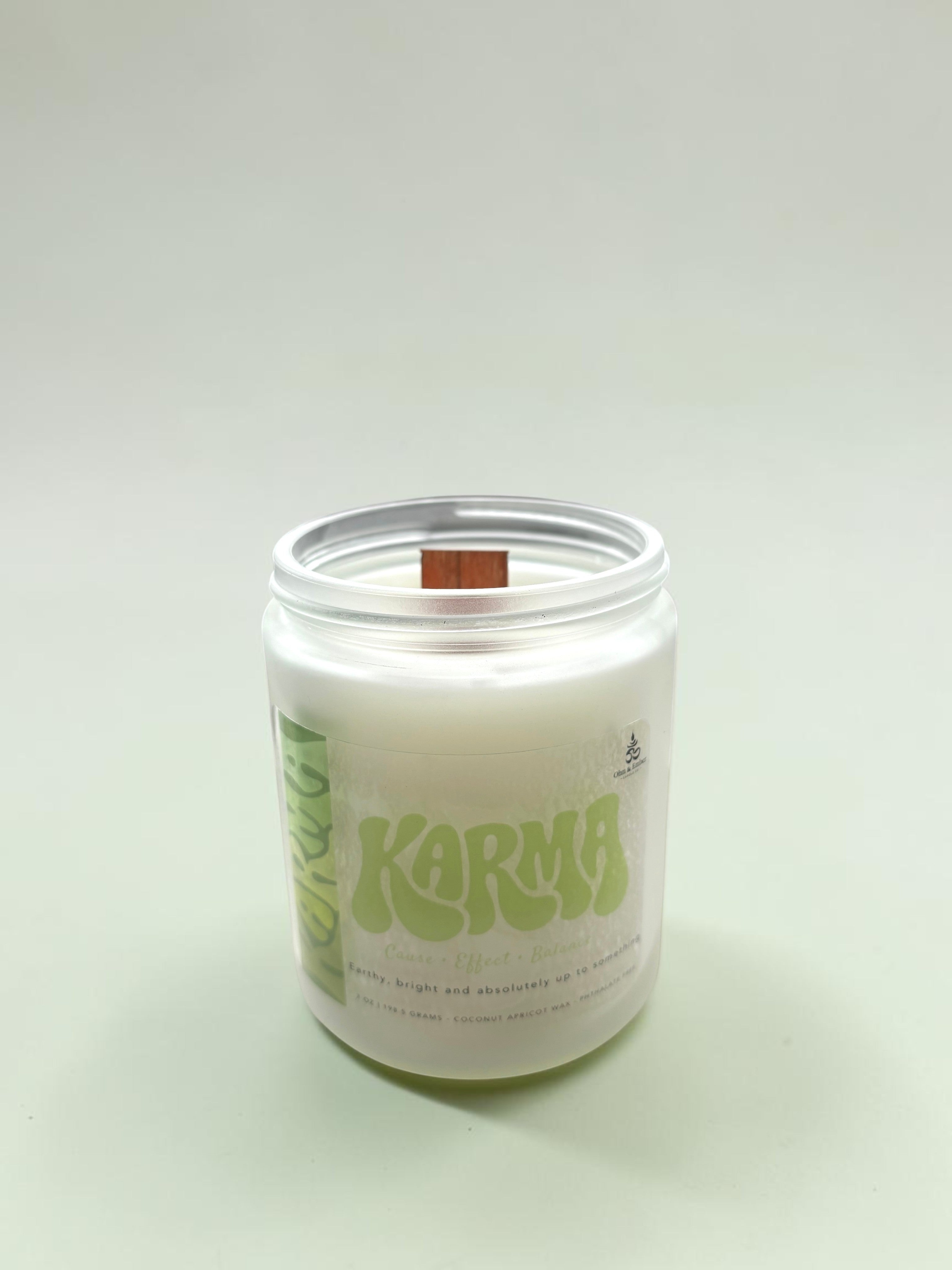Ohm and Ember Candles KARMA candle with citrus and patchouli scent, coconut apricot wax, wooden wick.