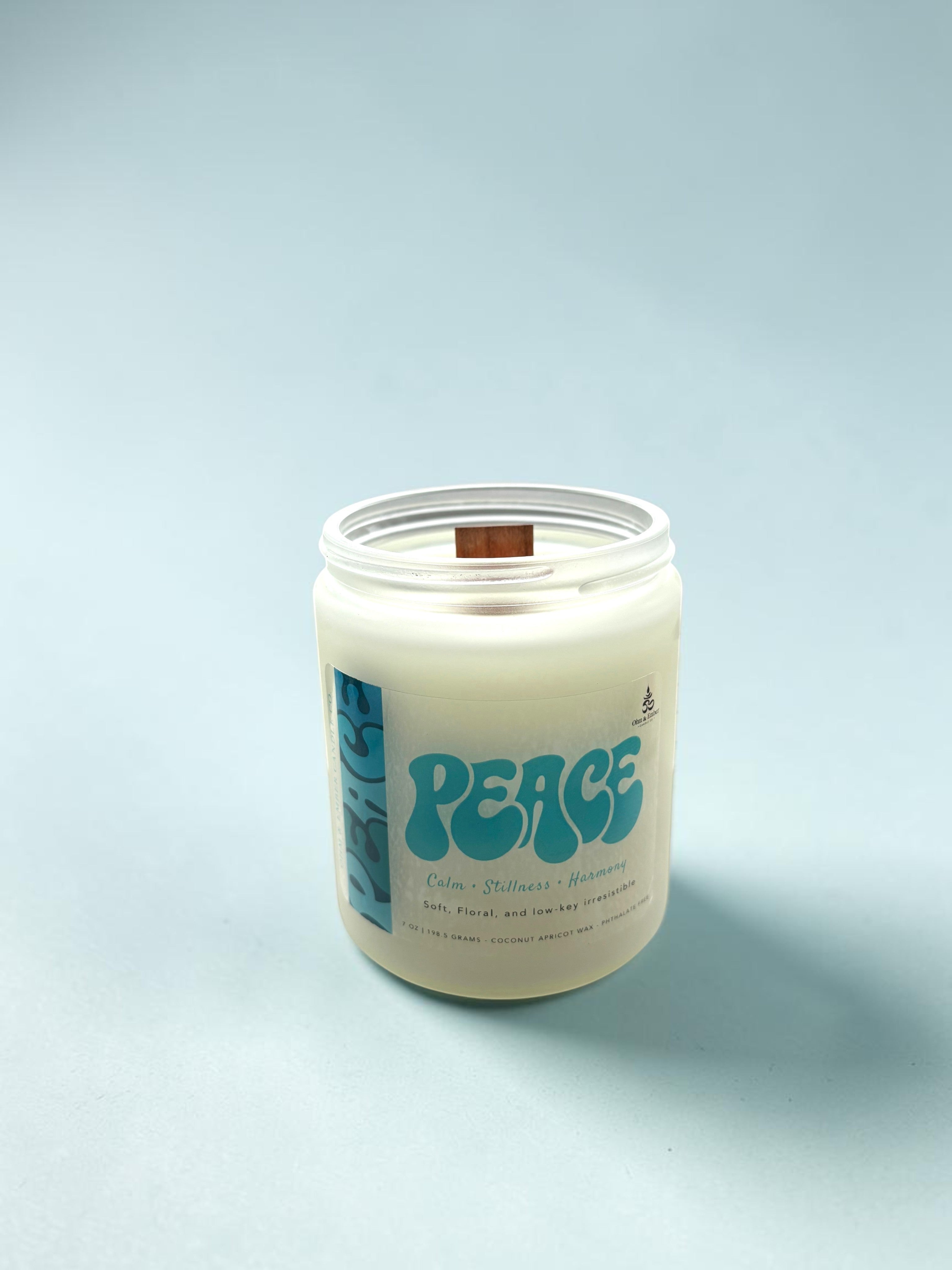 Ohm and Ember Candles PEACE candle with jasmine and rose scent, coconut apricot wax, wooden wick.
